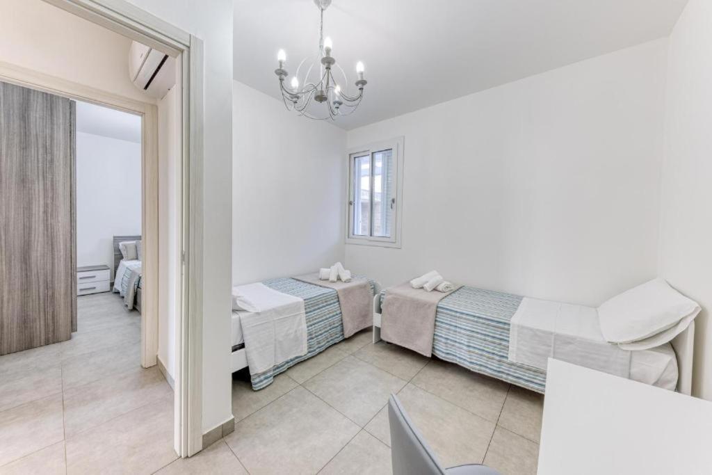 Residence Mia Amelie Торре-Сан-Джованни-Удженто Экстерьер фото